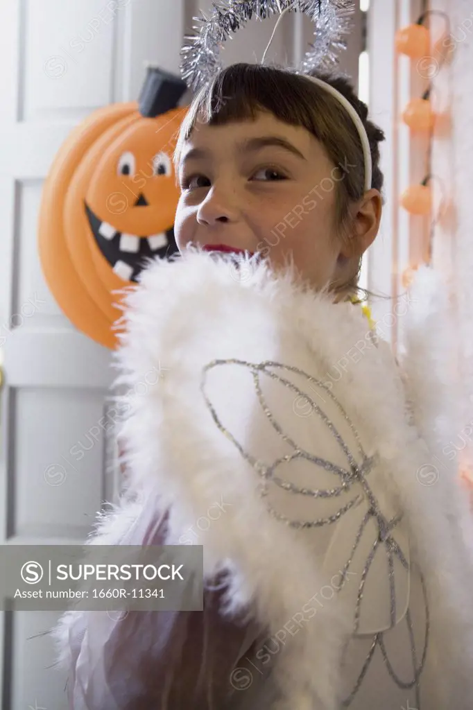 Profile of a girl dressed in a fairy costume