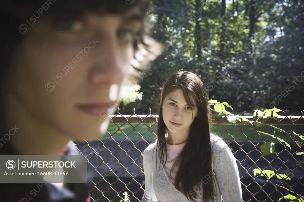 Portrait of a teenage couple in the park