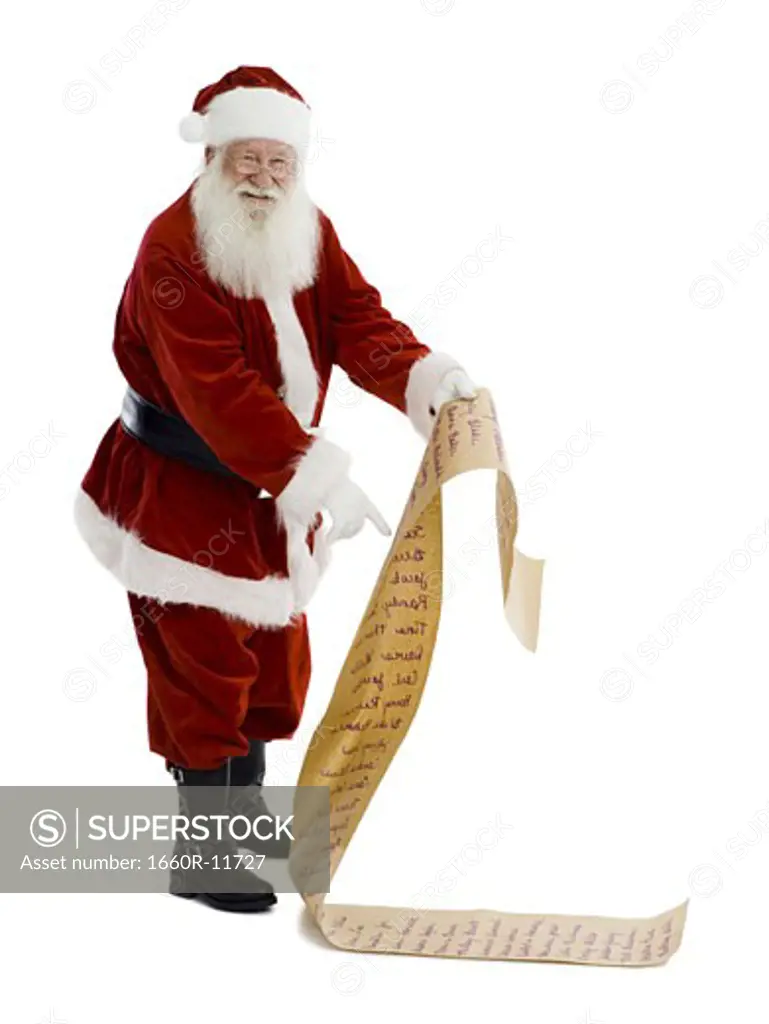 Profile of Santa Claus holding a long list