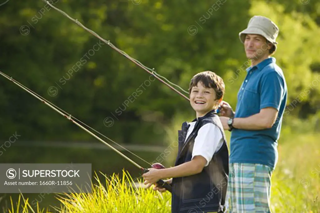 Man and his son fishing