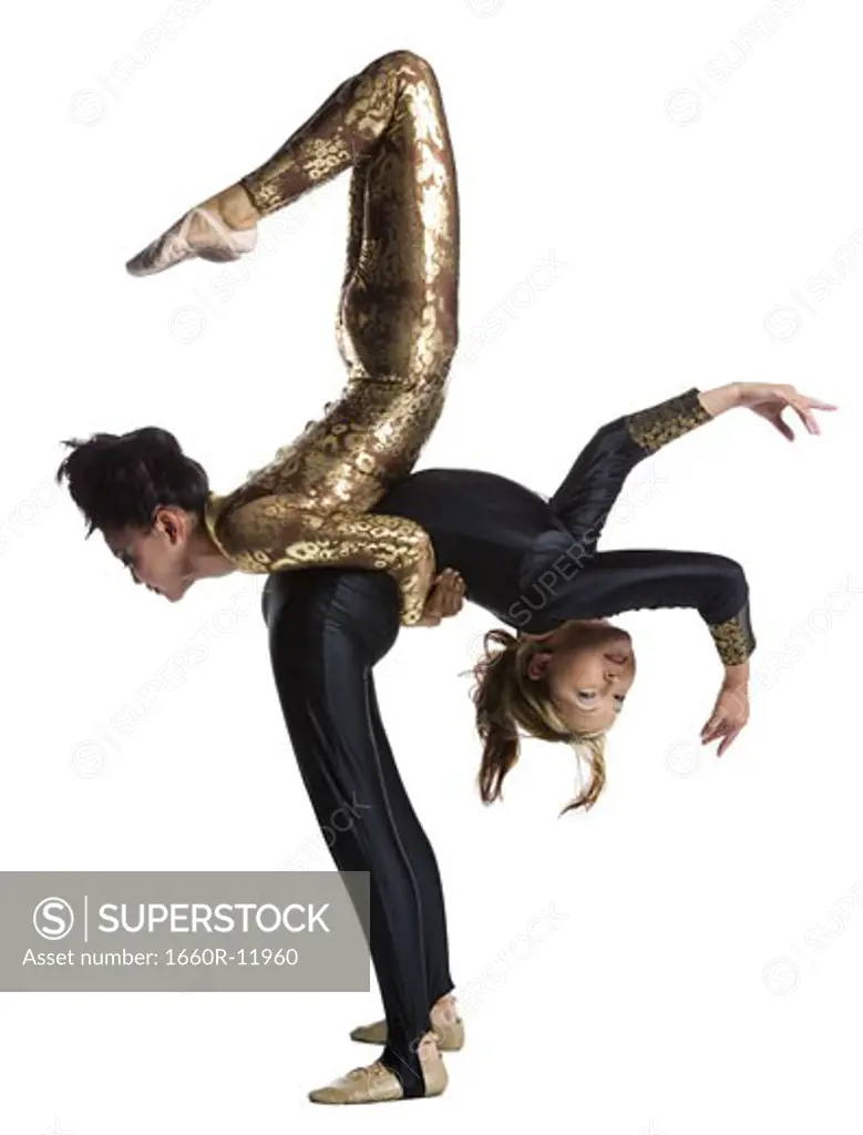 Female contortionist duo performing