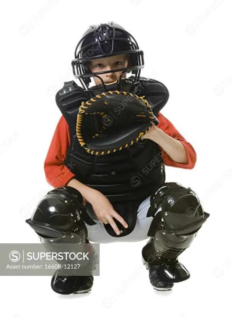 Portrait of a baseball catcher crouching