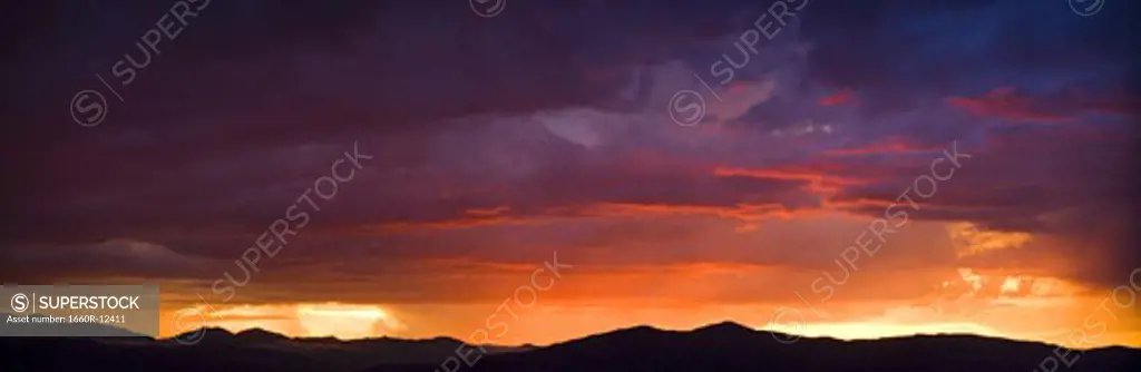 Clouds and a sunset over a mountain range