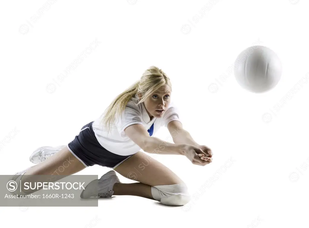 Close-up of a young woman playing volleyball