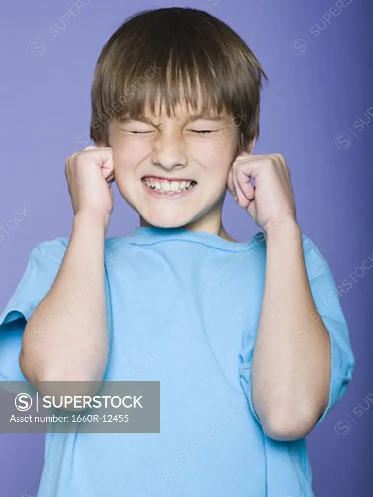 Close-up of a boy making a face