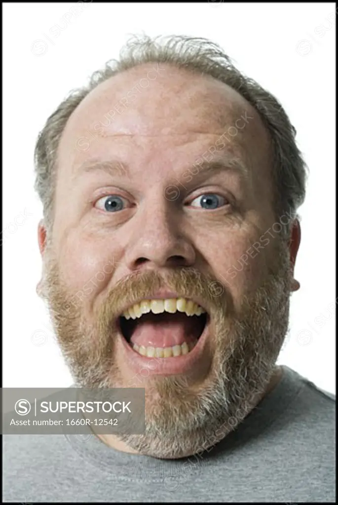 Portrait of a mature man looking surprised