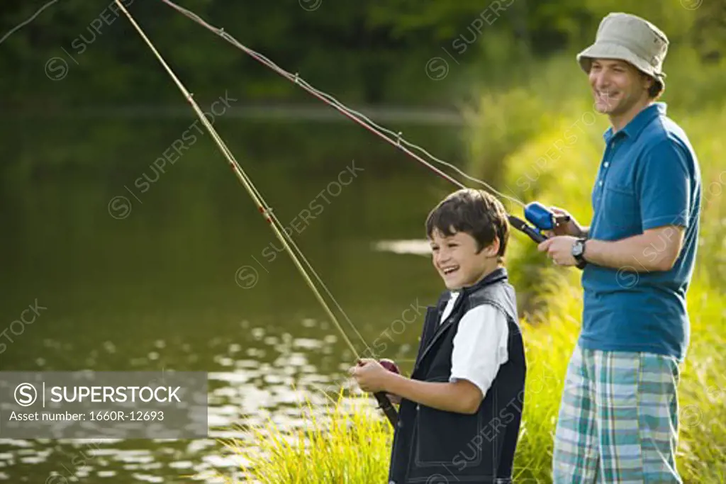Profile of a man and his son fishing