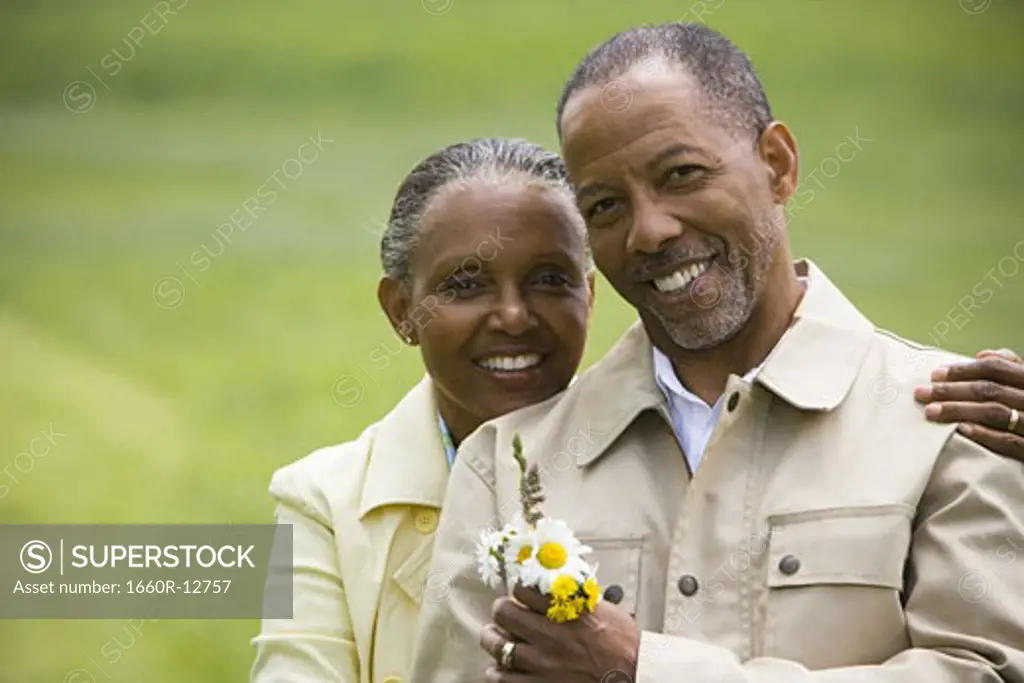 Portrait of a senior man and a senior woman smiling