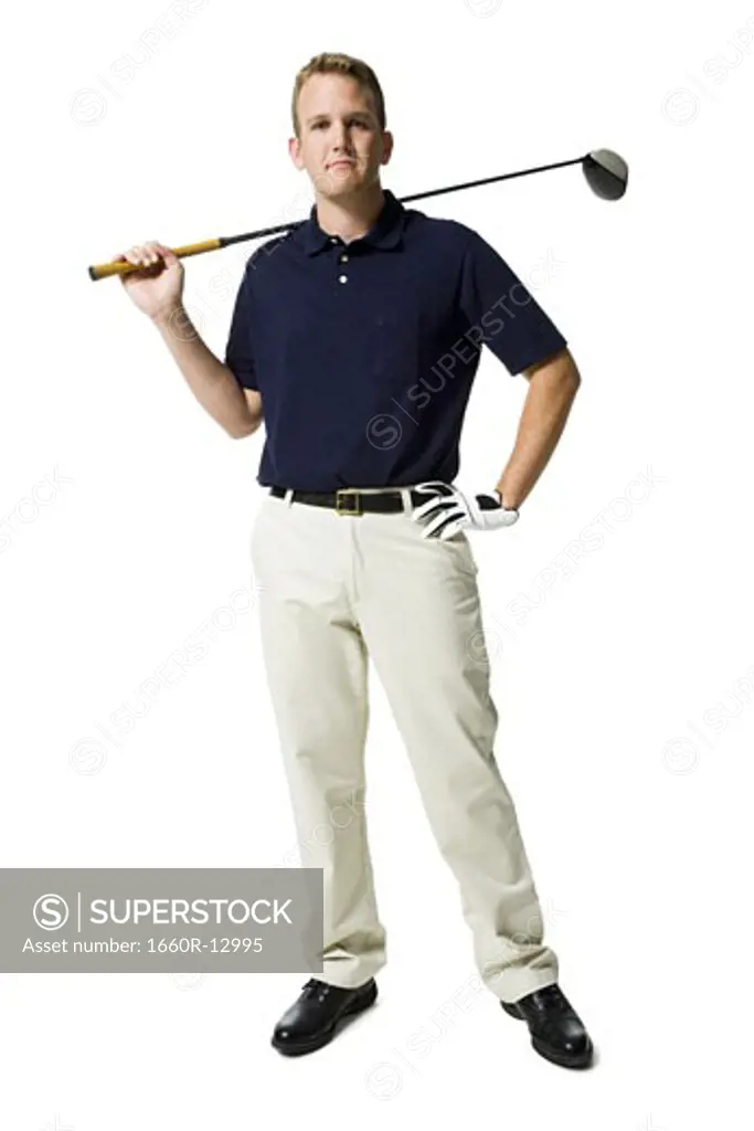 Portrait of a young man holding a golf club