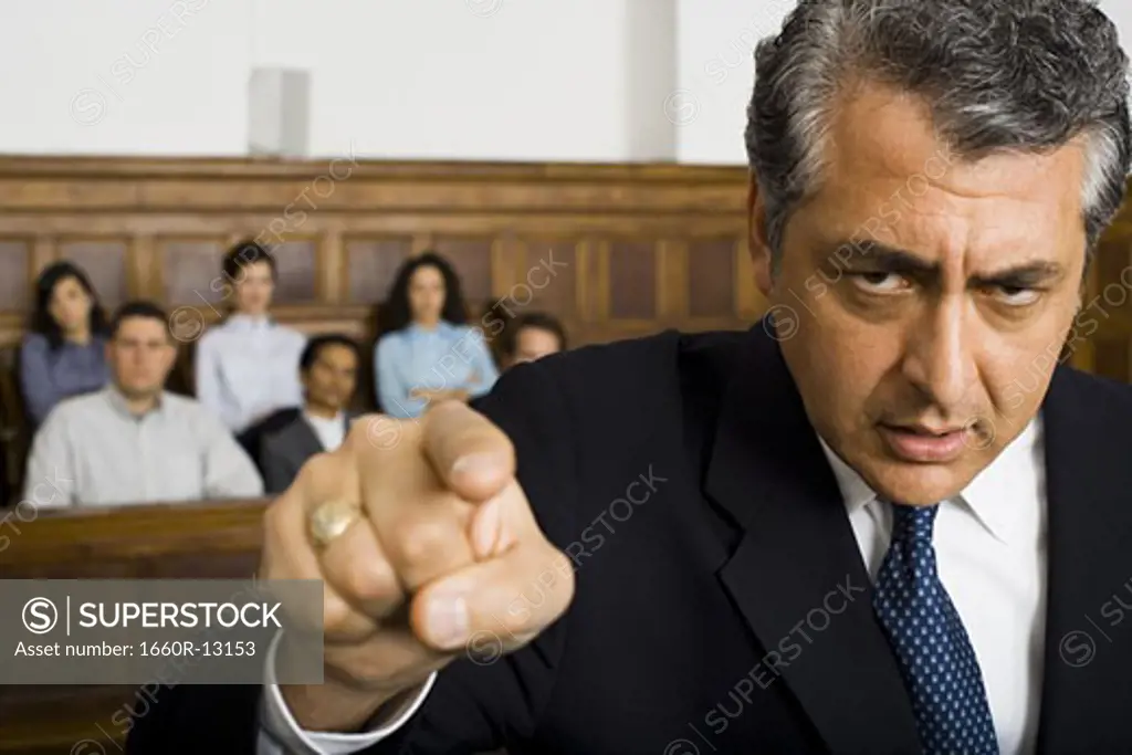 Portrait of a male lawyer pointing