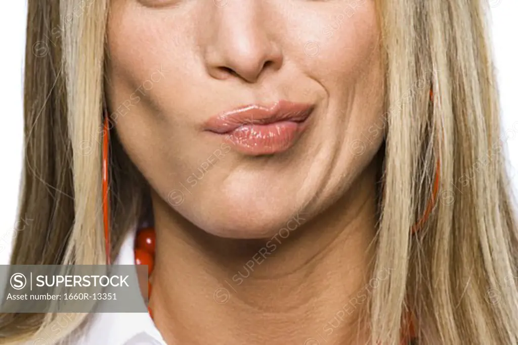 Close-up of a young woman making a face