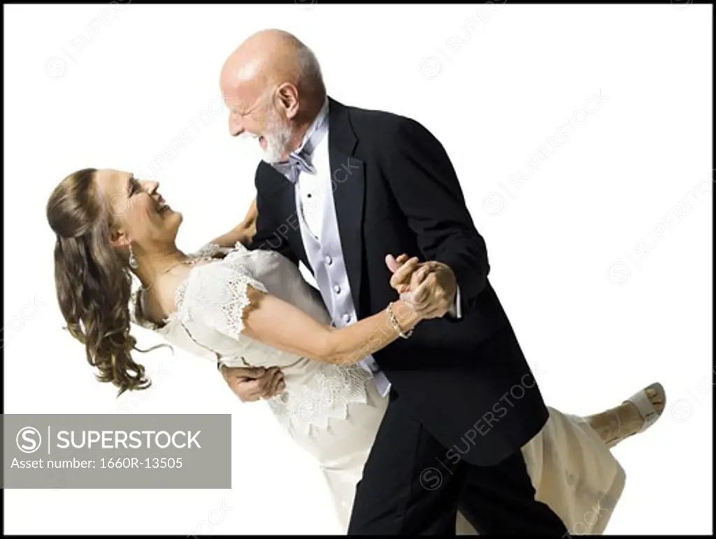 Close-up of a senior couple dancing