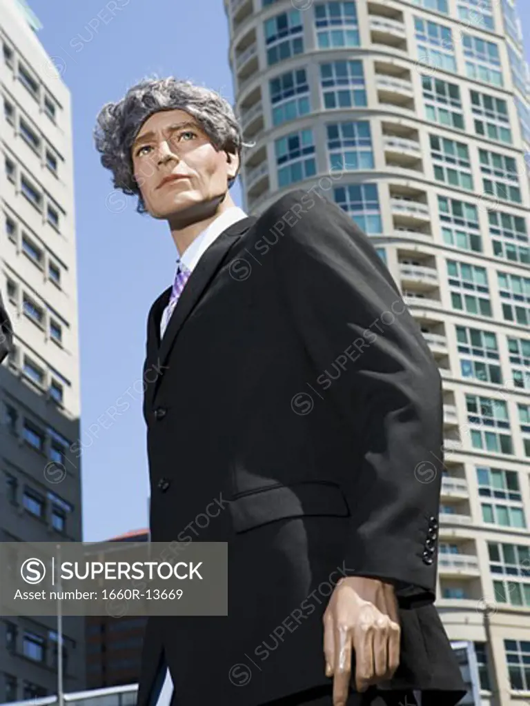 Low angle view of a mannequin portraying a businessman
