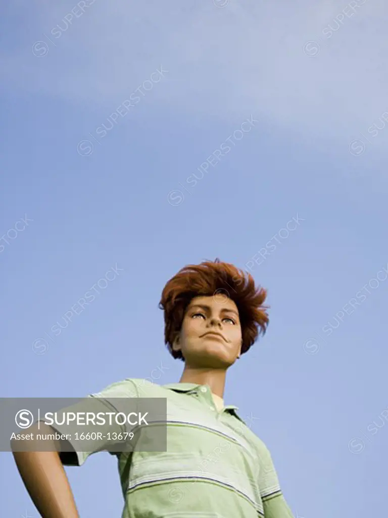 Low angle view of a mannequin portraying a boy