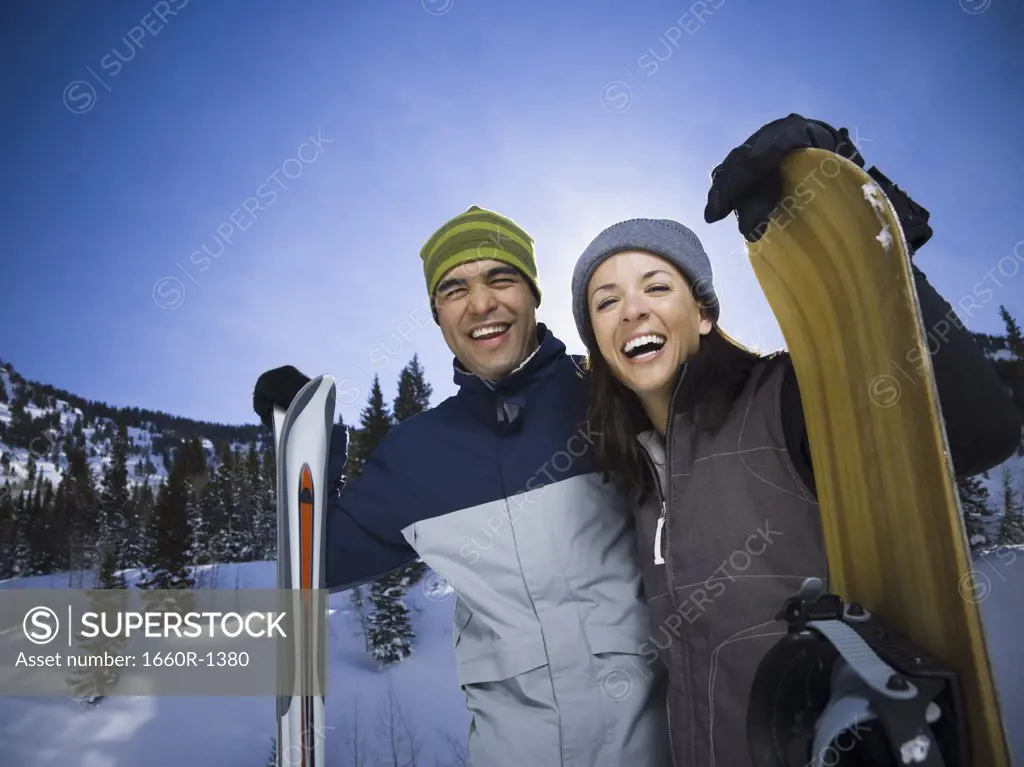 Portrait of a young adult couple smiling