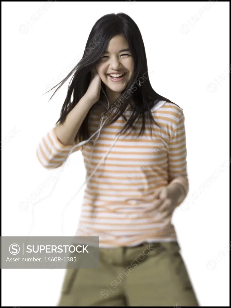 Portrait of a teenage girl dancing