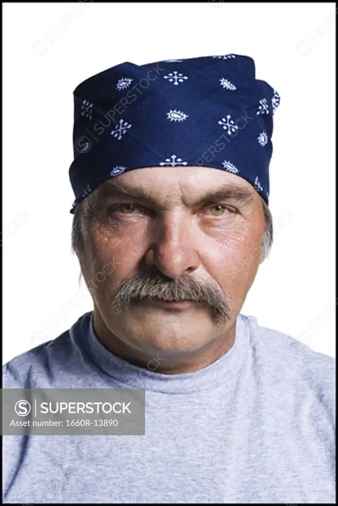 Disheveled middle aged man with head scarf