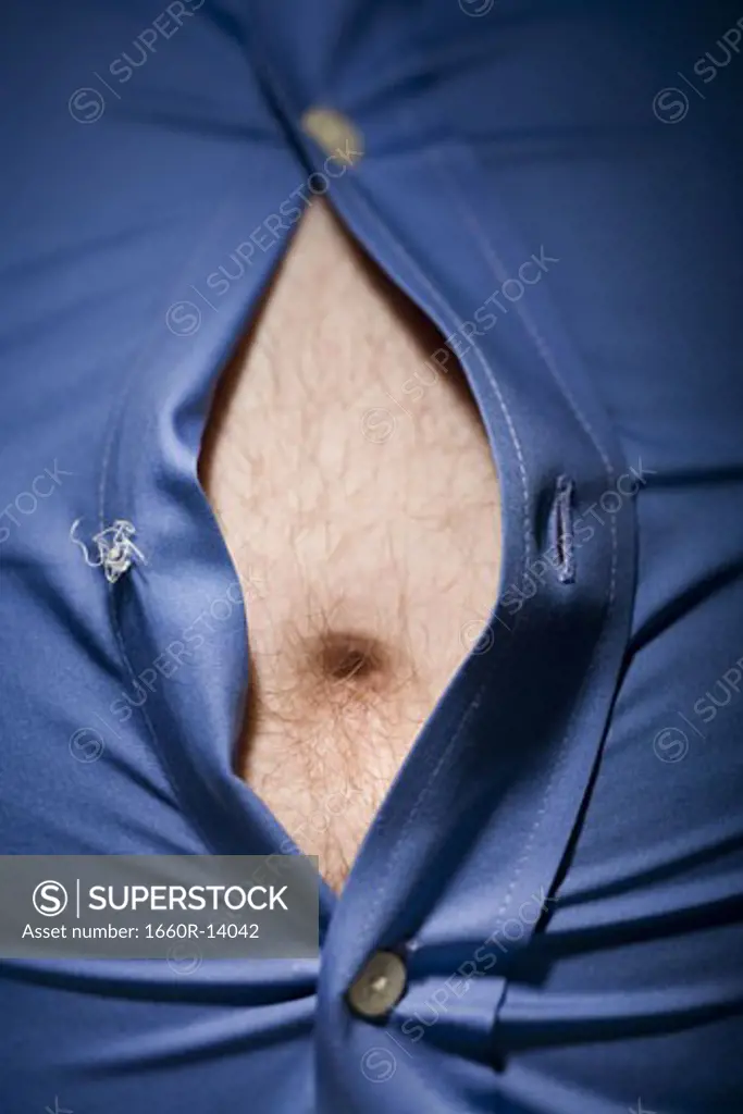 Close-up of fat stomach bursting through shirt