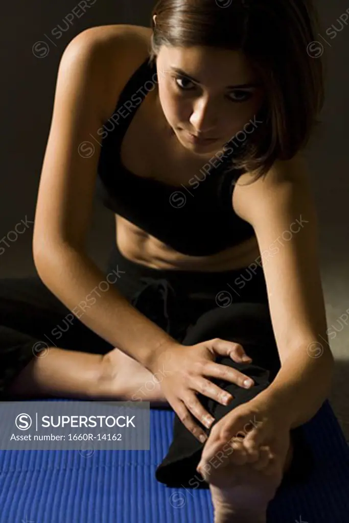 Woman performing stretching exercises
