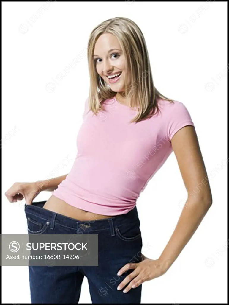 Young woman excited about weight loss