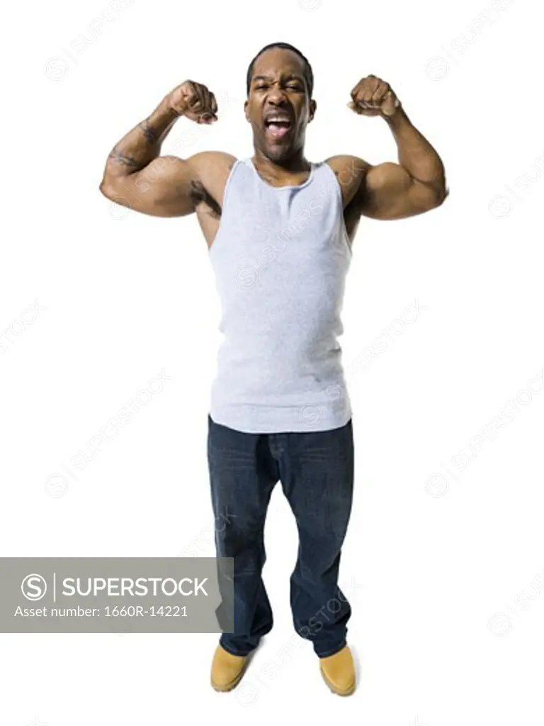 African American man flexing arm muscles
