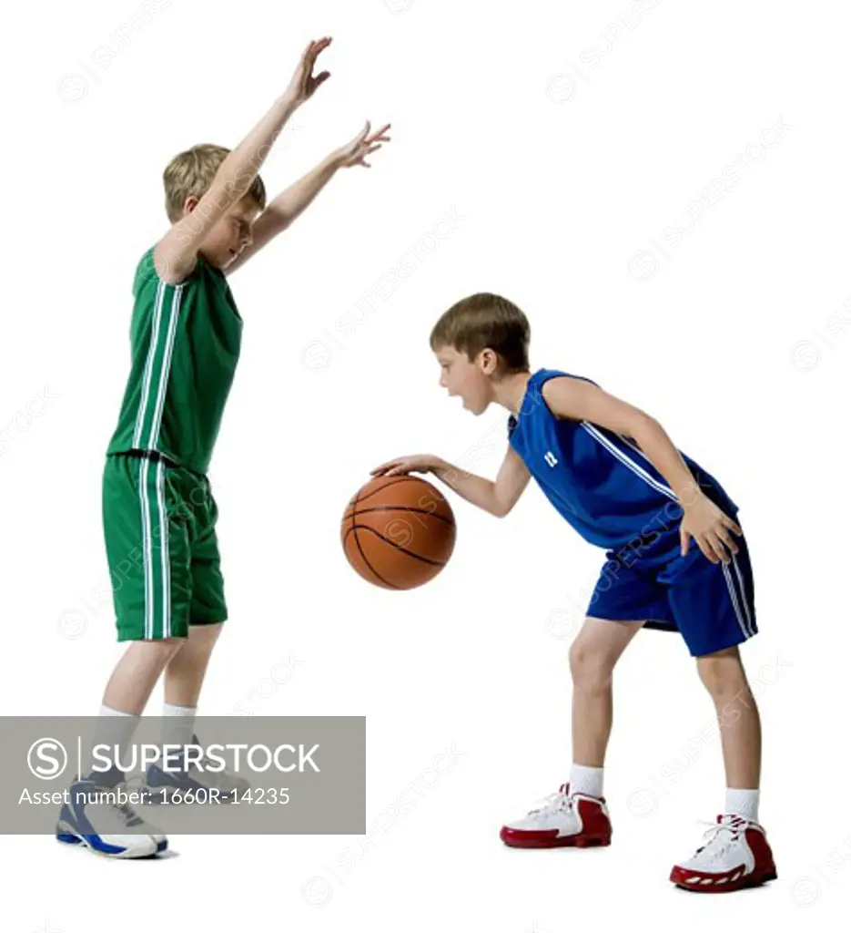 Young boys playing basketball