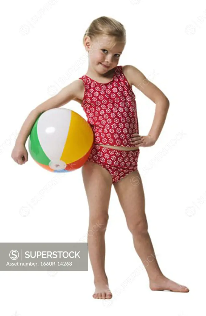 Young girl with beach ball