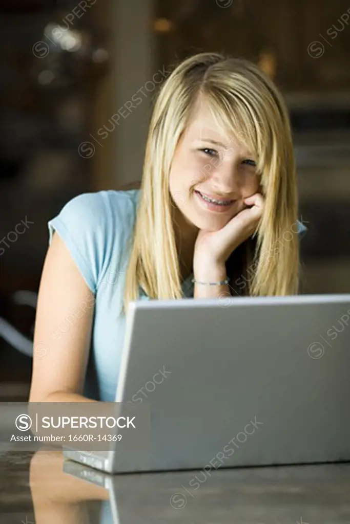 Young woman working on a laptop computer