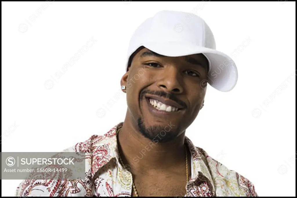 African American with ball cap smiling