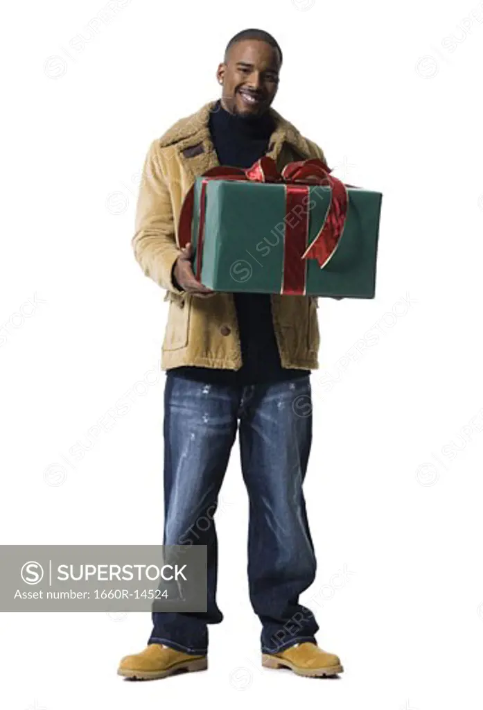 African American man with Christmas gift