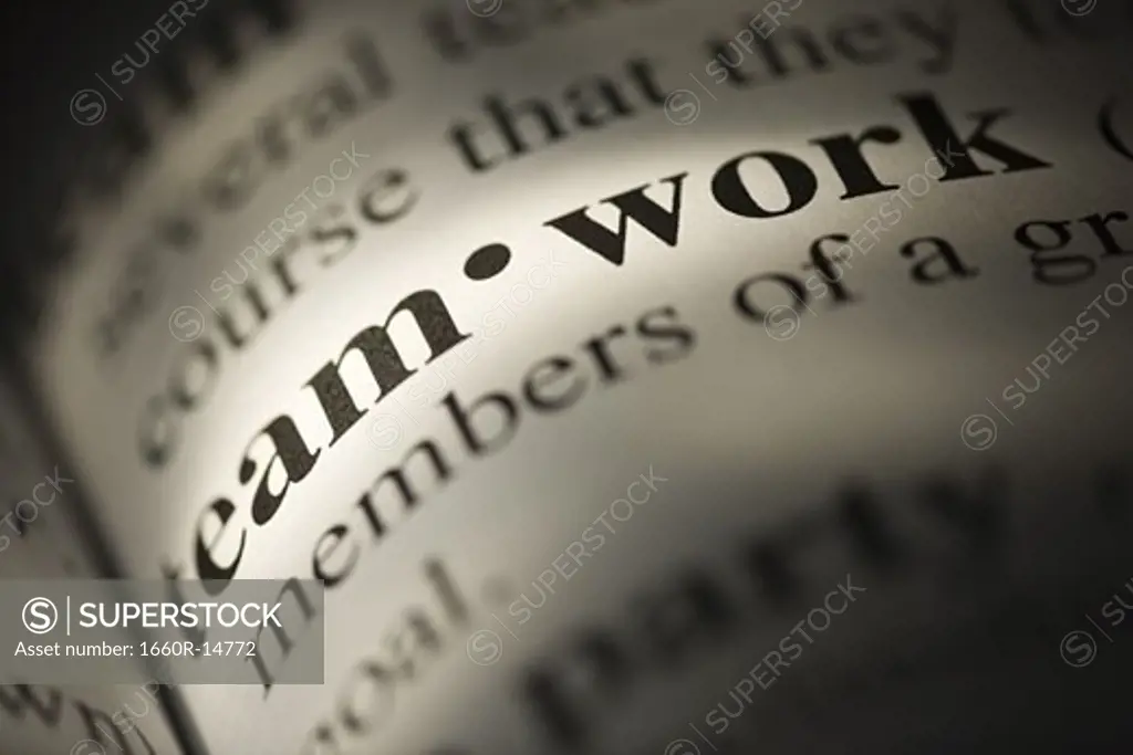 Close-up of dictionary definition - Teamwork