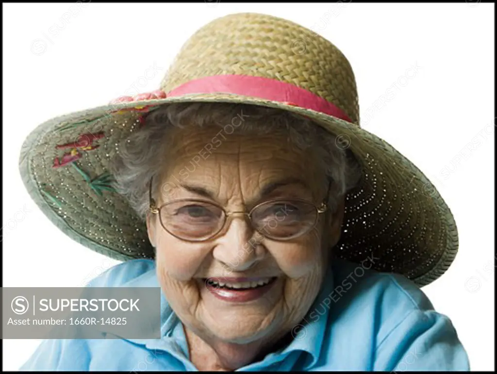 Elderly woman in a straw hat