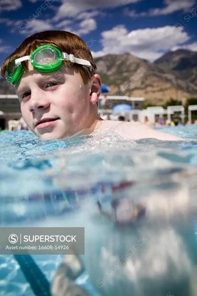 Boy in a swimming pool