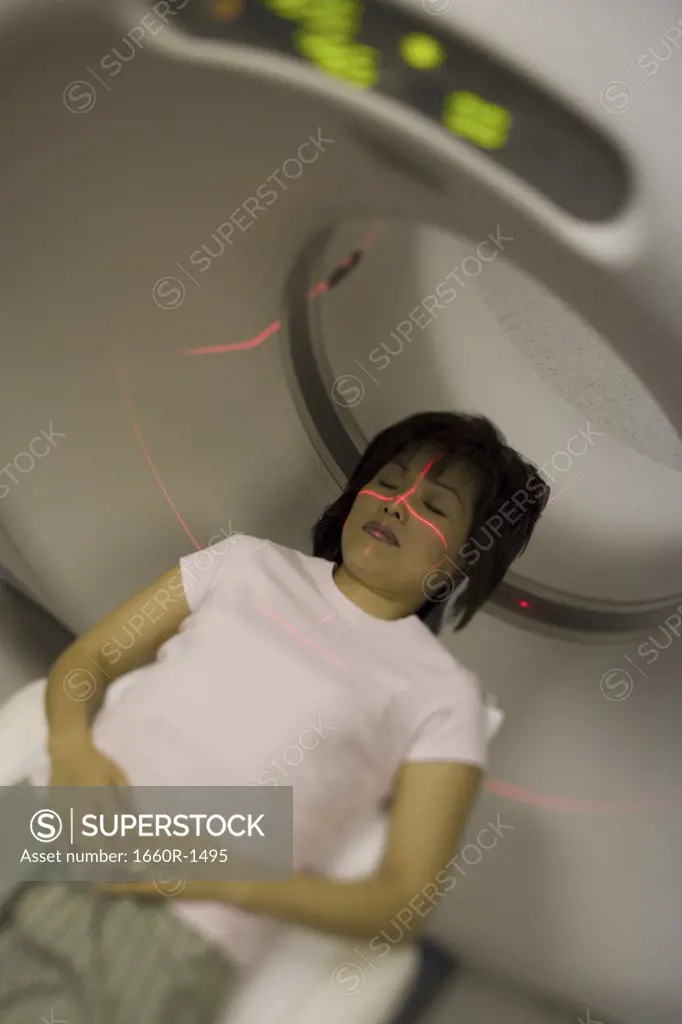 High angle view of a female patient getting an MRI scan