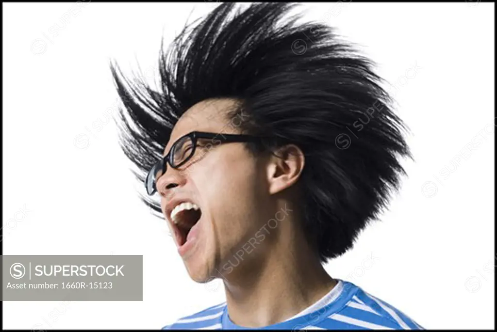 Laughing man with wild hair