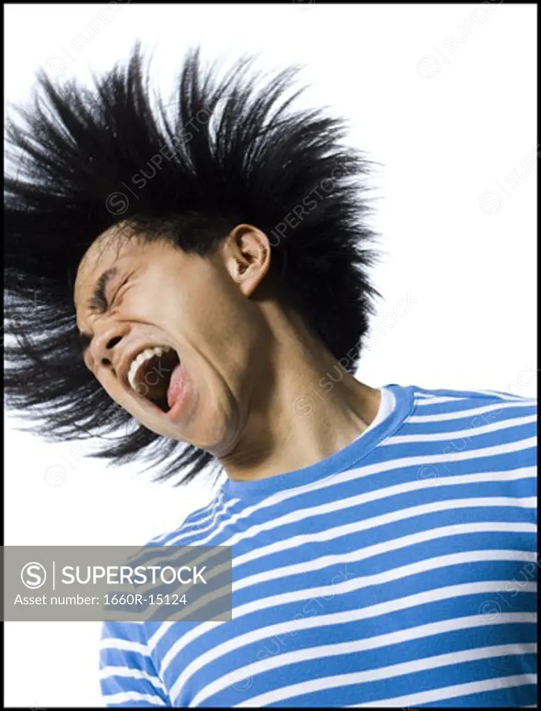 Laughing man with wild hair