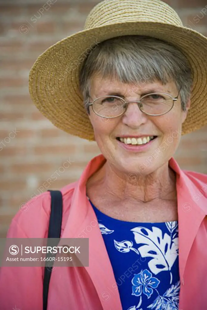 Elderly woman in a straw hat