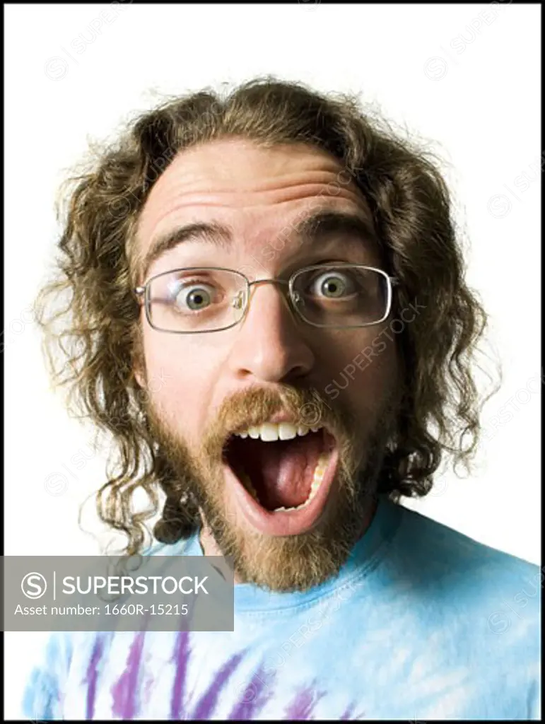 Surprised man with long hair and beard