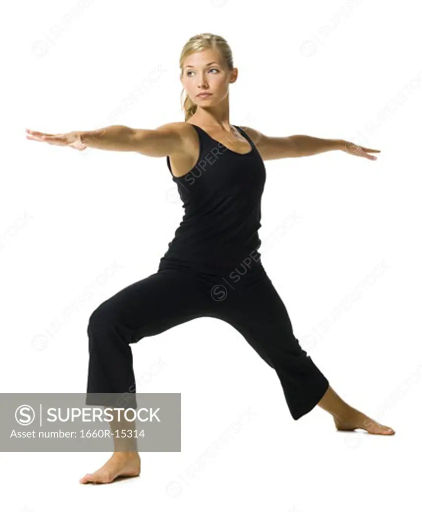 Fit woman stretching and exercising