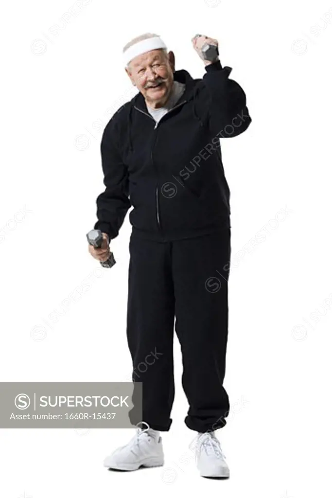 Older man doing dumbbell exercises