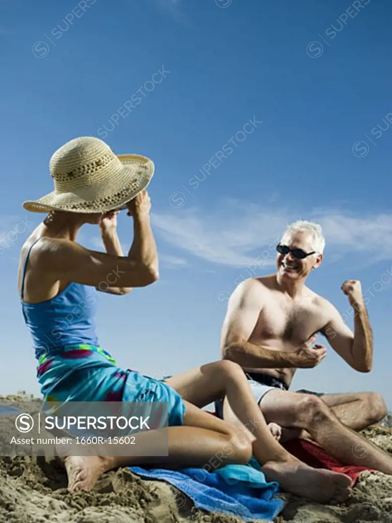 Mature couple relaxing at the beach