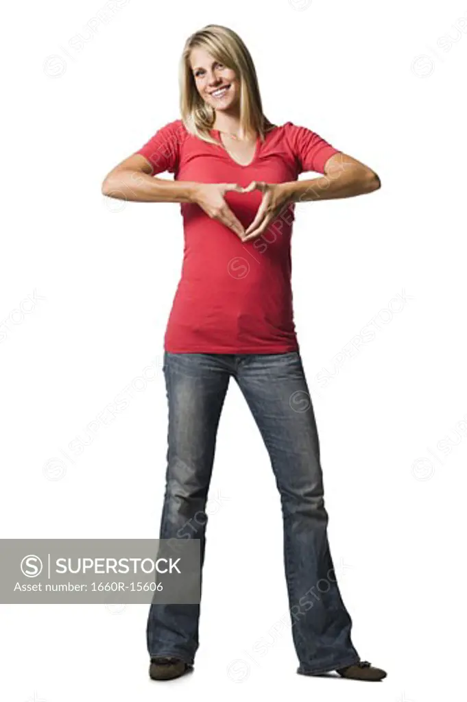 Woman making a heart shape symbol with her hands