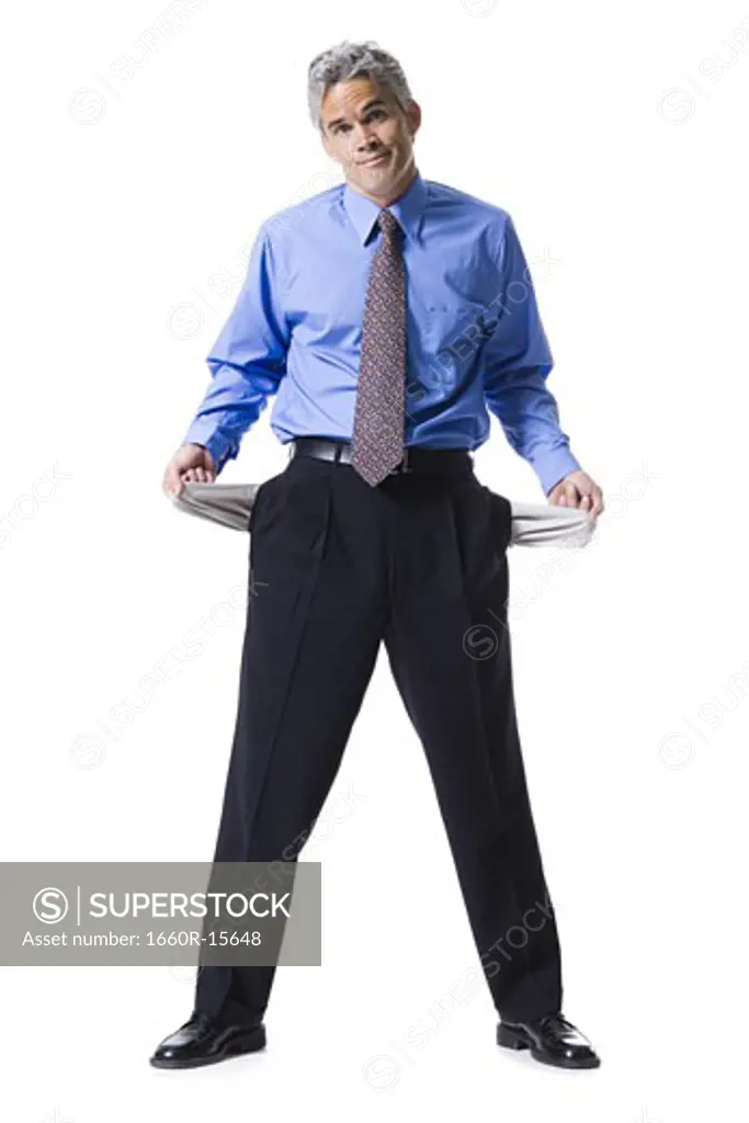Man with empty pockets inside out