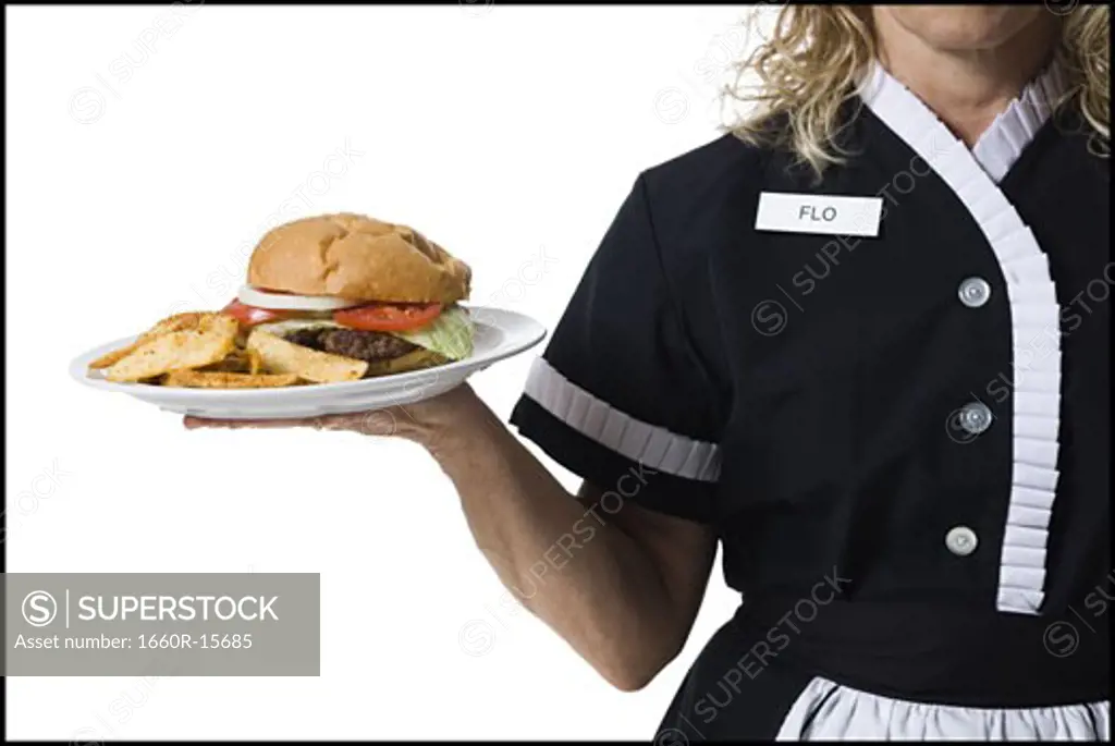 Waitress holding hamburger platter