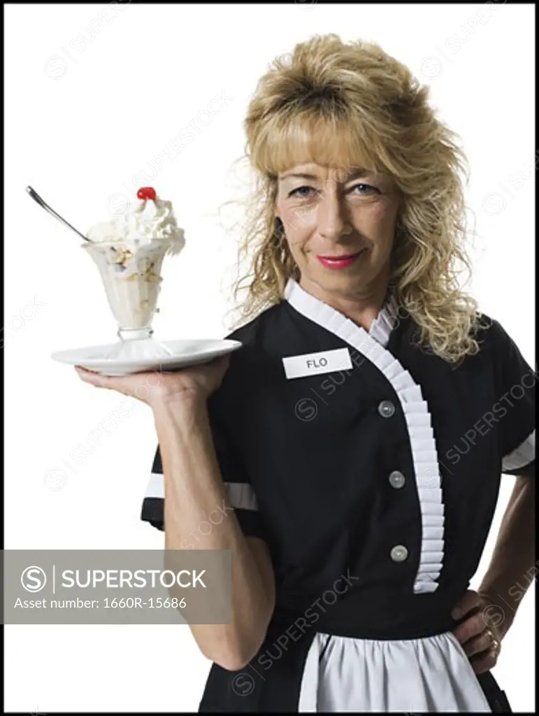 Waitress holding ice cream sundae