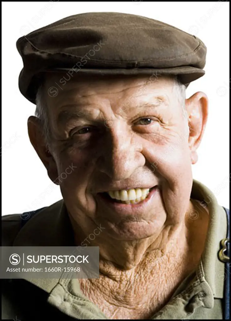 Older man wearing a flat cap