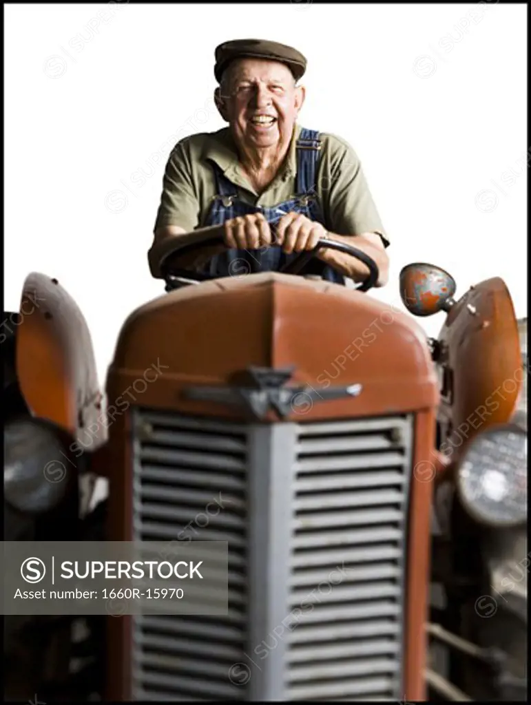 Farmer posing with his tractor