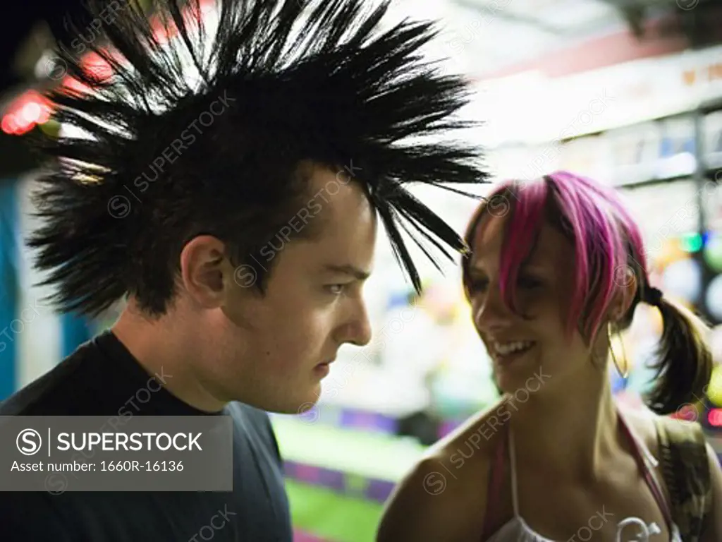 Punk couple at a fairground