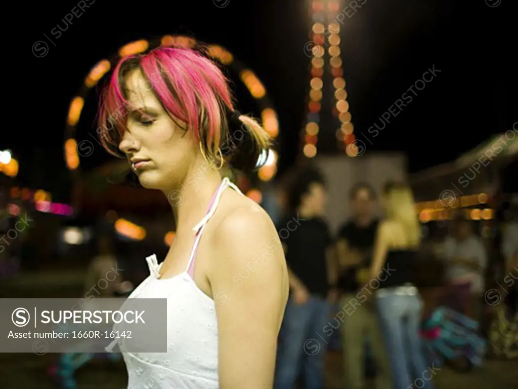 Female punk with dyed pink hair