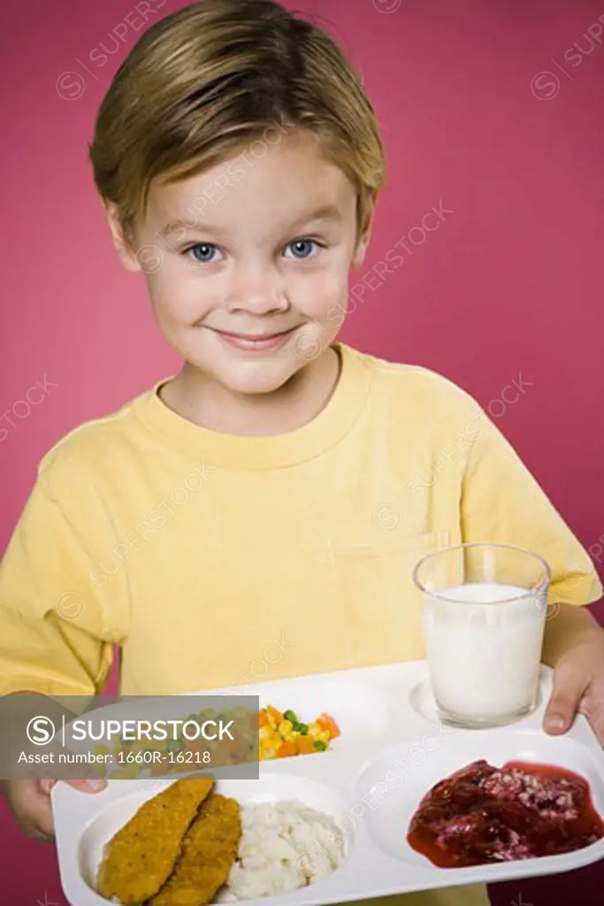 Boy with tray of food